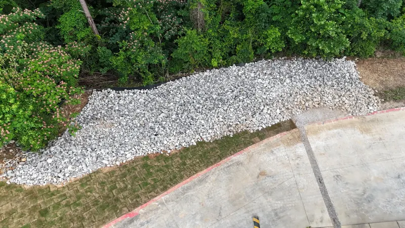 Rip rap drainage installation at an Alabama property
